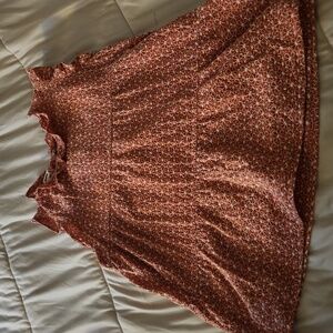 Embroidered sleeveless babydoll top